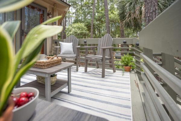 Fig rug on a patio with poly furniture