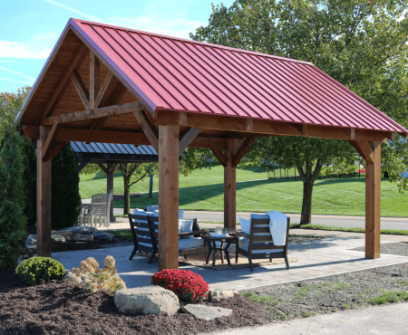 Mesa Cedar Timber Pavilion with a red metal roof,Mesa Cedar Timber Pavilion with a red metal roof,Mesa Cedar Timber Pavilion with stone posts ,Mesa Cedar Timber Pavilion post, brace and beam detail,Mesa Cedar Timber Pavilion tongue and groove sheathing